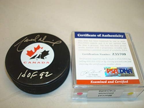 Марсилия Дионн Подписа Хокей шайба на националния отбор на Канада с Автограф на PSA/DNA COA 1A - за Миене на НХЛ с автограф